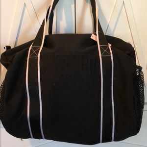 Pink black duffel bag
